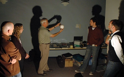 Participants modeling Earth-Moon interactions.